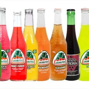 A row of Jarritos bottles in different flavors