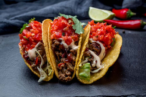 Mexican tacos with beef and guacamole